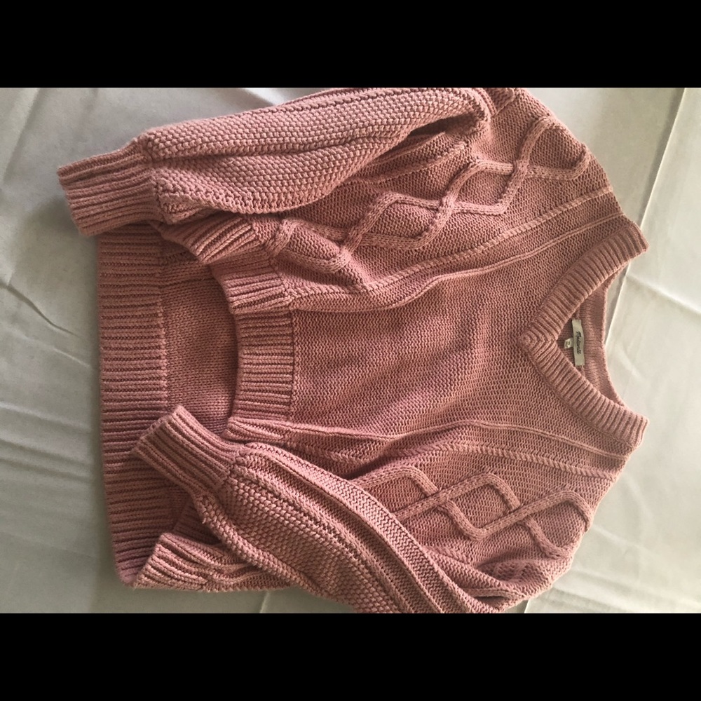 I am selling this pink kint sweater